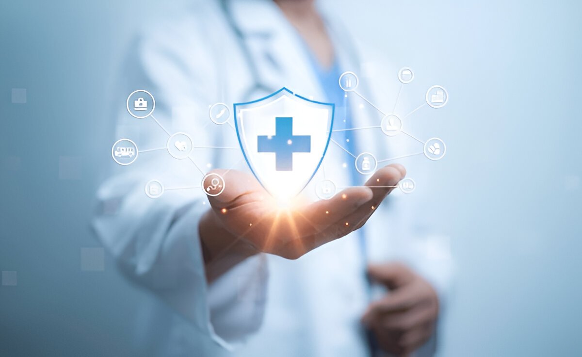 Doctor presenting a glowing shield with a medical cross and digital health icons in the background