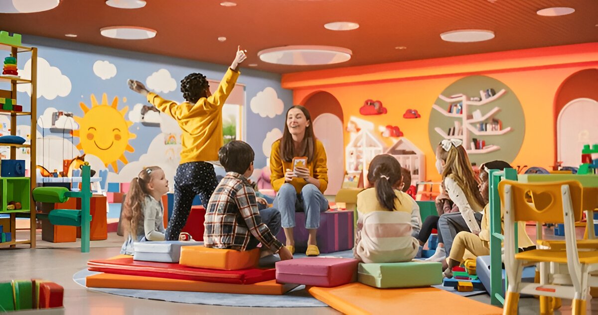 Children engaged in a classroom activity with a teacher in a colorful daycare setting.
